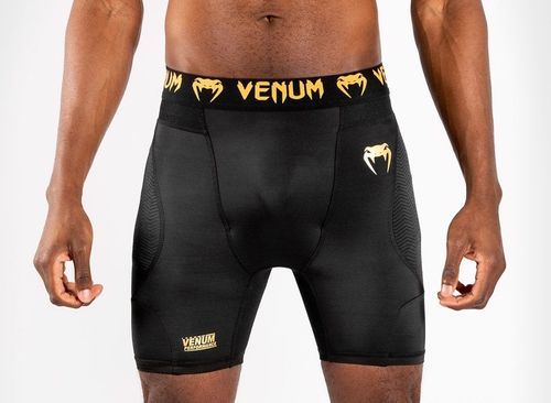 Venum G-Fit Compression Shorts schwarz/gold